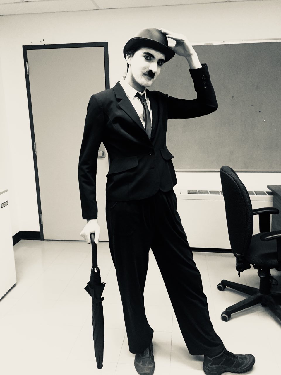 Photograph shows Abbas Mehrabian in a Charlie Chaplin Costume